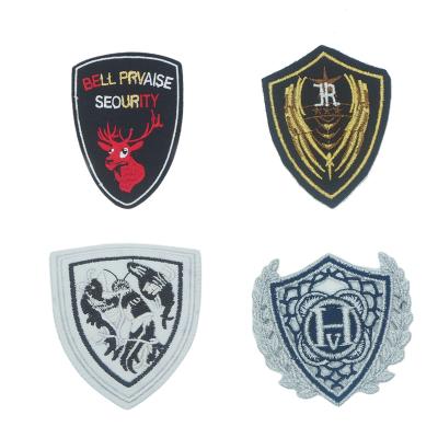 China Viable High Quality Fashion Sew-on 3D Logo Shield Patches Custom Embroidery Jacket Patch for sale