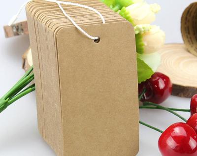 China paper & Cardboard Custom Paper Tag Customized Kraft Paper Fashion Clothes Paper Tag for sale