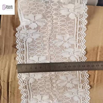 China Viable Hot Selling Knitted White Lace Border Stocklot Fabric In China for sale