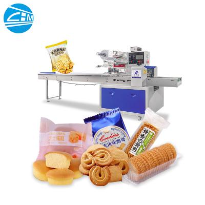 Cina Automatic cupcake Sandwich Biscuits muffin Tiramisu Macaron Cookies Puffs Packaging Packing machine Machinery in vendita