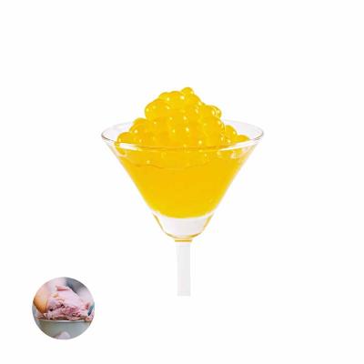 China Nutritious Hot Selling Vegans Mango Flavored Popping Boba For Shaved Ice Cart Use for sale