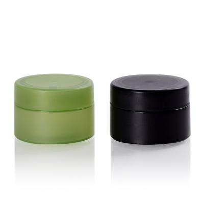 China PP Cosmetic Round 50g Matte Plastic Cosmetic Jar Green Black Frosted Skin Cream Jars With Lids for sale