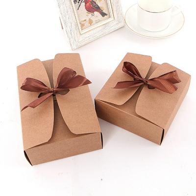 China Recycled Brown Materials Paper Bow Kraft Candy Snack Cookie Soap Chocolate Foldable Packaging Box With Ribbon for sale