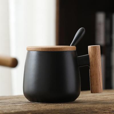 China Viable Hot Selling Ceramic Coffee Mug Stoneware Mug with Bamboo Lid and Wooden Handle for sale