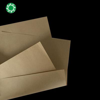 China Competitive Price 100% Virgin Kraft Paper Roll Liner Anti Curl Brown Board For Packaging for sale