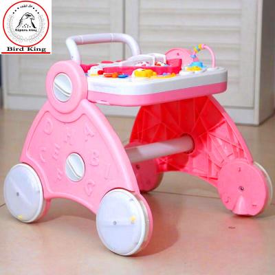 China Children's multi-function walker with music and light baby trolley dish dinner toy car bird four-wheel King W-006 for sale