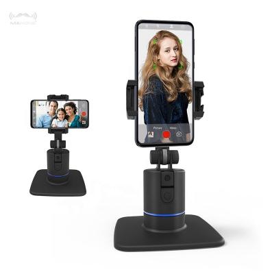 China Mobile Phone No APP Portable Smart Shooting AI Geniuses authomatic 360 Rotation Object Auto Face Tracking Phone Holder for sale