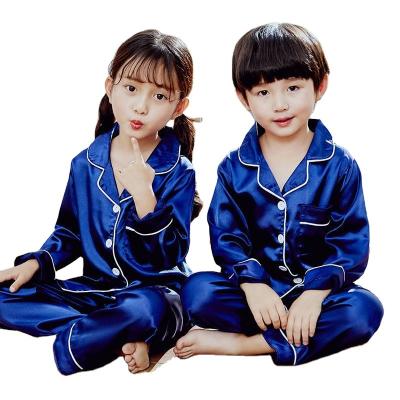 China Hot item spring and autumn children's breathable clothes for men and women silk long sleeve casual pure color pajamas for sale