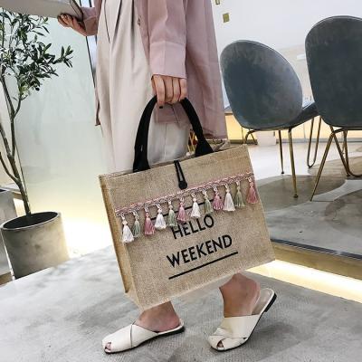 China Other Summer Letter Print Straw Beach Handbag Tassel Jute Tote Bag Canvas Women, Jute Tote Bags Beach, Recycle Jute Tote Sisal Bag for sale