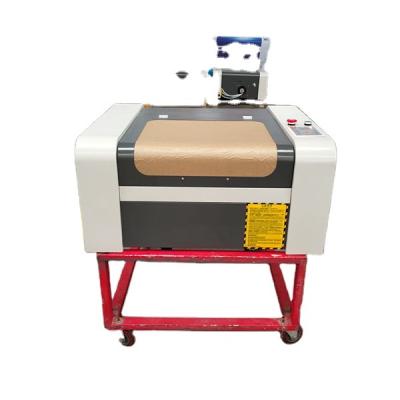 China Laser CUTTING plexiglass and sheet MJ 4040 cutting machine RD 40W 50W for none metal material laser cutting and engraving machine for sale