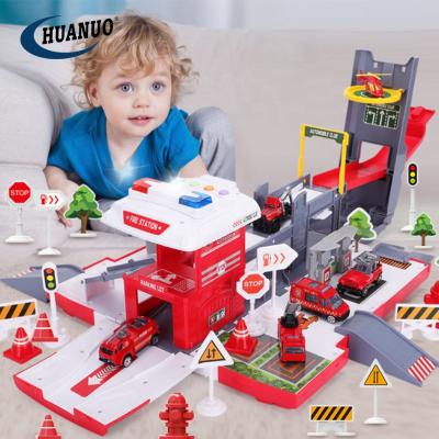 China Amazon toy alloy car slide noise/sound/music/simulation/educational game storage function set plastic garage toy deformation fire truck diy toy for sale