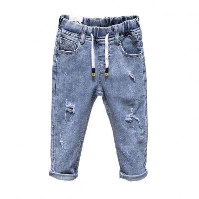 China MKMN Autumn QUICK DRY hot sale fashion fringed stretch feet kids jeans small damage jeans for kids for sale