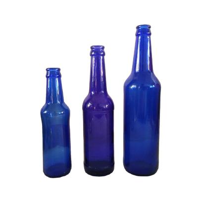 China 2021 Beverage Factory Direct Sale Cobalt Blue Wine Beer Liquor Beverage Glass Spirit Empty Bottle 330ml 500ml With Crown Cap Top for sale