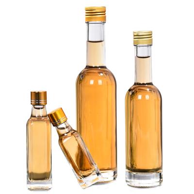 China Wholesale High Quality Round Empty Cooking Oil Canola Sesame Oil Storage Glass Bottle Square 50ml 100ml Mini Cooking Oil Bottles for sale