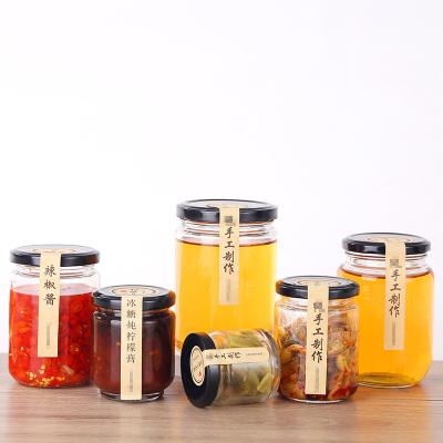 China 2021 Hot Selling 380ml Transparent Fancy Bee Honey Storage Jar Wide Round Glass Empty Viable Mouth Honey Jars With Custom for sale