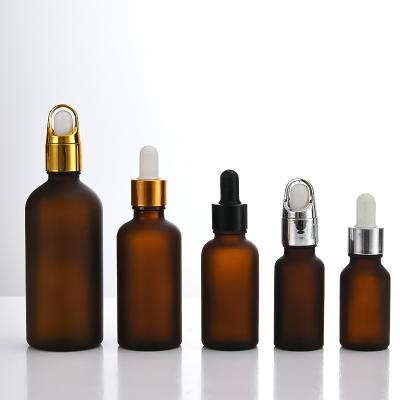 China Hot Selling Skin Care Cosmetics Amber Boston Round Glass Bottle Cosmetic Packaging Oblique Shoulder 30ml 60ml 100ml With Droppers for sale