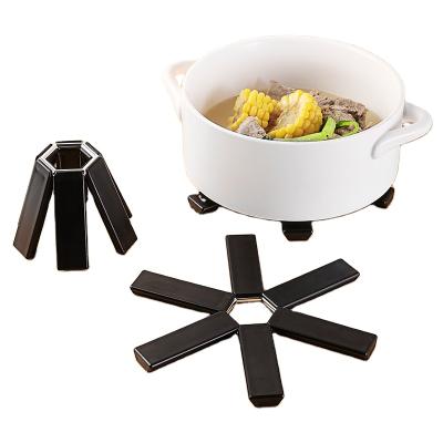 China Creative Portable Foldable Pot Making Machine Home Kitchen Pot Holder Heat Insulation and Anti-scalding Dishes Place Mat Cup Mats for sale