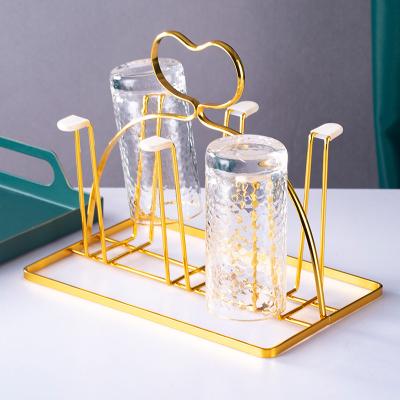 China Creative Storage Household Gold Metal Viable Metal Water Glass Cup Holder Heart Cups Hanging Drying Rack for sale