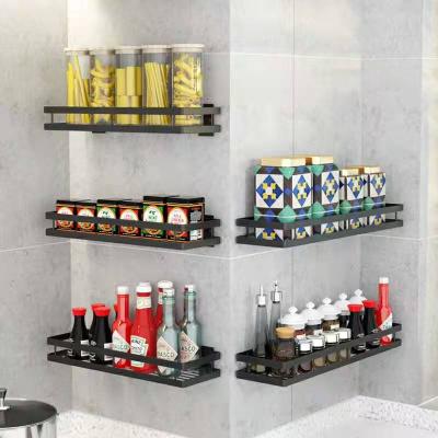 China Sustainable Hot Sale Kitchen Free Punching Wall Mounted Black Metal Spice Bottle Rack for sale