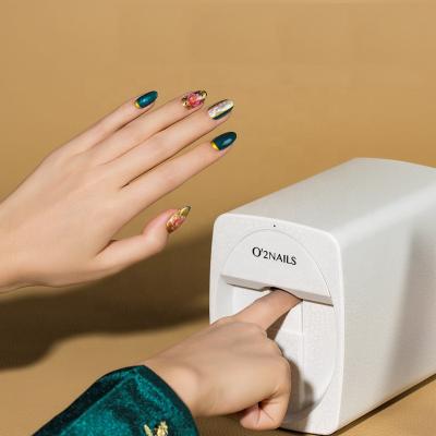 China Newest Plastic Colorful Digital Nail Art Portable Diy Mobile Mini ABS Nail Printer Automatic Nails Printer for sale