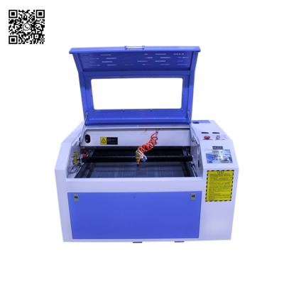 China CO2 Laser Cutter 6040 CNC 80W Deep Spotting Laser Cutting Engraving Machine 600*400mm Made In China Jinan City Ruida Board Optional for sale