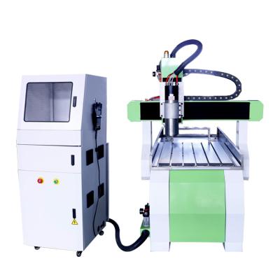 China Hotels China Factory Jinan 3d CNC Router ATC Automatic Wood Carving Router 6090 with 4 Tool Auto System Offline Controller for sale