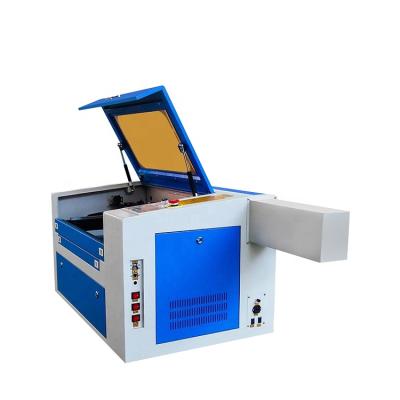 China Laser CUTTING Yongli Laser Tube Laser Machine 400*400*300mm Mini Size 50 CO2 60watt Working Cutting Machine With Ruida Control System For MDF for sale