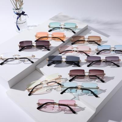 China Internet Celebrity Recommend Fashion New Tinted Glass Woman Men Sunglasses Fashion Square Rimless Sun Glasses for sale