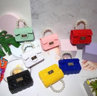 China Fashion Candy Colors Cute Pearl Small Bags For Baby Gilrs Kids Bags for sale