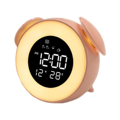 China LUMINOVA Kids Cartoon Wholesale Hot Selling Cute Mini Alarm Clock With Wake Up Light for sale