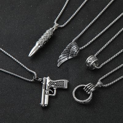 China High quality men tend gun bullet pendant bossy retro creative angel wings alloy necklace for sale