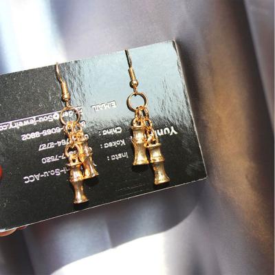 China High Quality Fashionable Lightweight Gold Dangling Earrings Women's Alloy Charm Earrings for sale