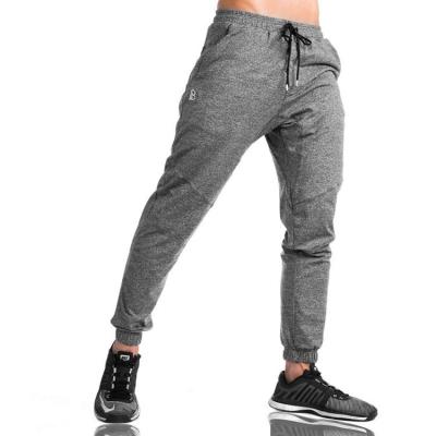 China Tipo hecho punto Sweatpants gris para hombre de la tela de los basculadores corrientes para la categoría de edad de los adultos en venta