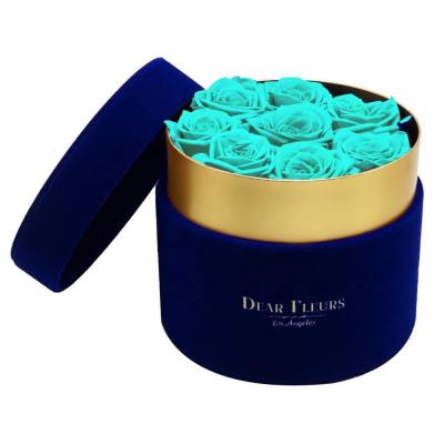 China Handmade Luxurious Blue Velvet Round Bouquet Gift Box With Gold Foil Logo for sale