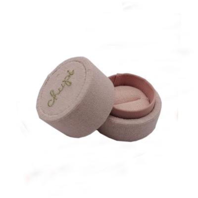 China Luxury Round Canvas Pink Ring Gift Box With Embroidered Simple Logo for sale