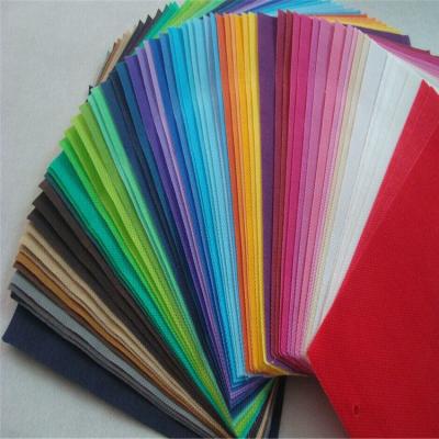 China 80gsm nonwoven fabric anti-static popular material, colorful pp nonwoven wine bag for sale