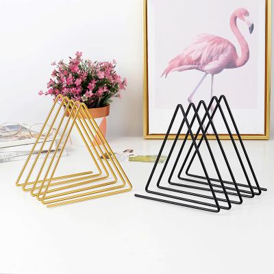 China Wholesale Durable Nordic Gold Creative Desk Triangle Wrought Iron Style Magazine Storage Rack Metal Desk Book Rack for sale