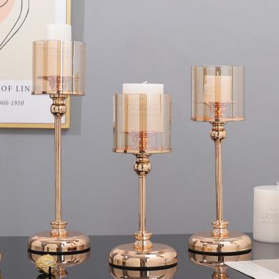 China Creative romantic candle light table decoration candle holder candle light style Nordic gold light luxury French metal candle holder for sale