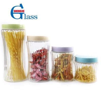 China Freshness Preservation Wholesale Clearly Set 4 Jar Glass Supplier Glass Jar Supplier With Different Design Tin Lid for sale