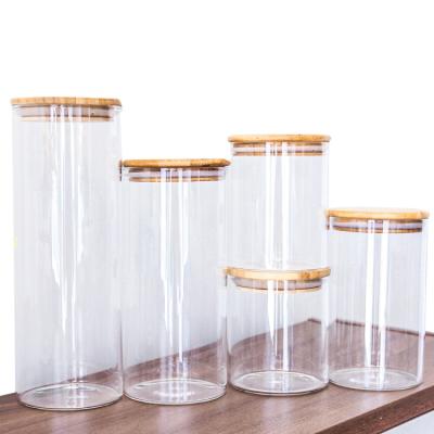 China Heatable Set 4 Round Glass Canisters Airtight Bamboo Lid Storage Glass Jars for Kitchen for sale