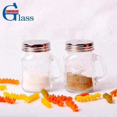 China Viable Food Safe Storage Jar Accessories 100% Silver Lid Glass Bottles Rectangular Glass Spice Jar With Handle for sale