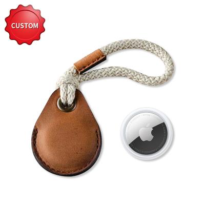 China 2022 Shockproof Vegetable-tanned Crazy Airtag Case Cowhide Horse Key Chain Biodegradable Genuine Leather Airtag Holder Plug for sale