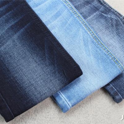 China 9.8 oz TR Denim Fabric Shrink-Resistant Jeans 69%cotton 26%Polyester 3%Rayon 2%Spandex for sale