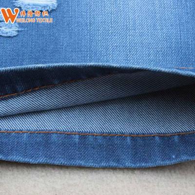 China Stretch Cotton Denim Fabric Factory Prices Lower Free Sample Denim Fabric Textile Stock Lot for sale