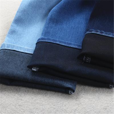 China Elastic Stretch Satin Denim Fabric For Female With Black Backside for sale