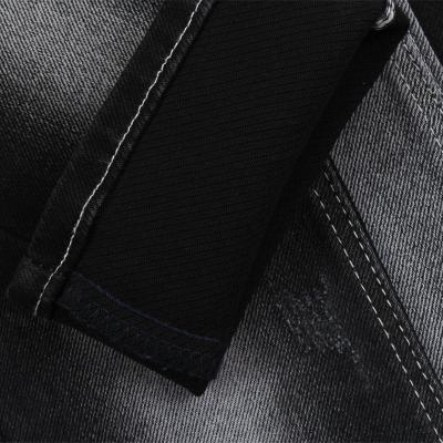 China Special Shrink-Resistant New Fashion Texture High Stretch 12 Black Once Black Denim Fabric For Brand Jeans for sale