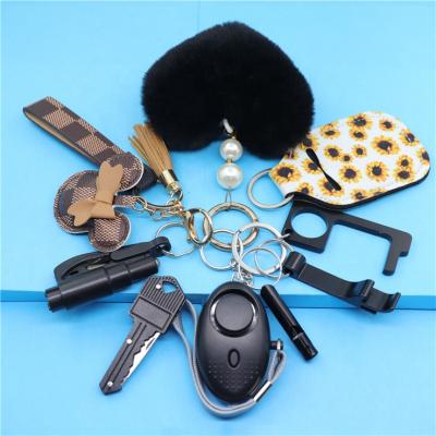 China Eco-Friendly Self-defense Key Chain Alarm Women Self-defense Key Chain Products Set for sale