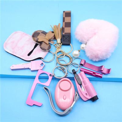 China Eco-Friendly Kitty Dog Self Defense Tool Multi Function Heart Self-Defense Key Chain Key Chain for sale