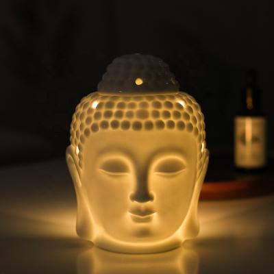 China Simple Fragance Asia Style Aromatherapy Incense Oil Burner Buddha Head Chinese White Black Ceramic Lamp Candle Censer Essential Oil Lamp for sale