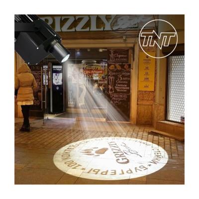 China TNT 60w 80w 100w 150w Waterproof Aluminum HD Rotating Advertising Projection Lamp Outdoor Gobo Spotlight for sale